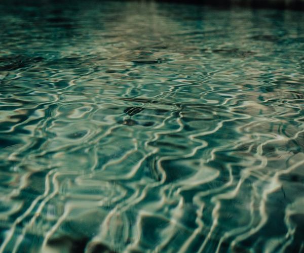 Abstract gentle waves representing the flow of breath.
